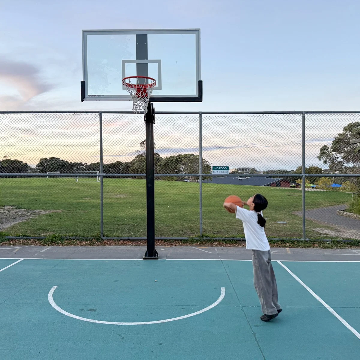 Her first basketball experience - new but enjoyable!